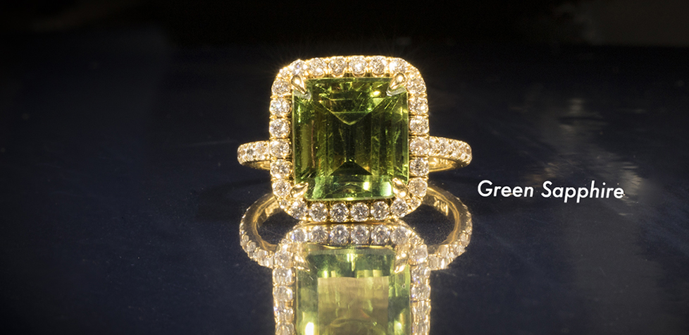 Green sapphire halo ring