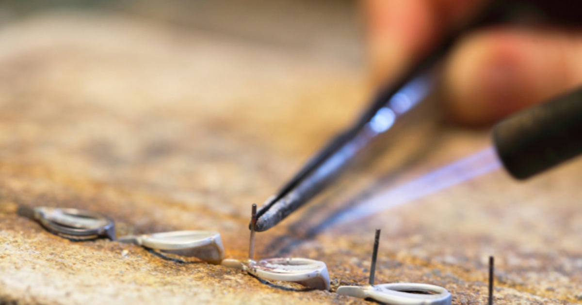 Jeweler working on a bracelet